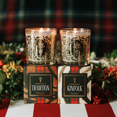 Classic Holiday Pair Kinfolk and Tradition holiday candles with festive decor